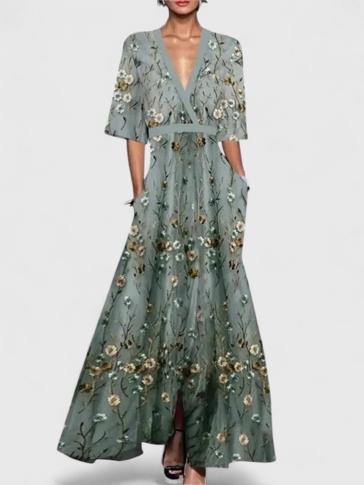Aimee Elegant Floral Maxi Dress With Bold Red Bloom Pattern by Selouva