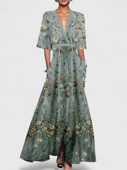 Aimee Elegant Floral Maxi Dress With Bold Red Bloom Pattern by Selouva