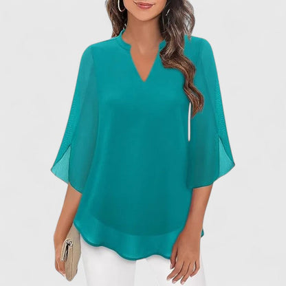 Ellie Sophisticated Black Blouse With Relaxed Fit And Sheer Sleeves by Selouva