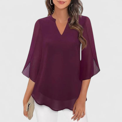 Ellie Sophisticated Black Blouse With Relaxed Fit And Sheer Sleeves by Selouva